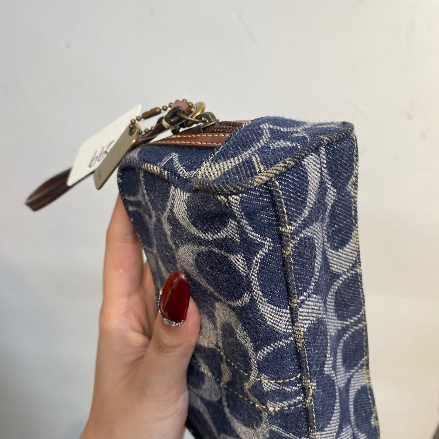Coach 牛仔化妝袋