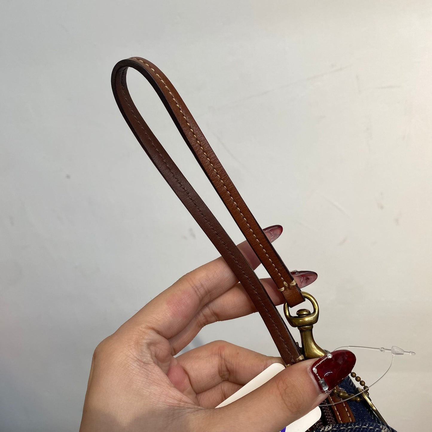 Coach 牛仔化妝袋
